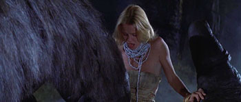 Kong gives Dwan the finger.