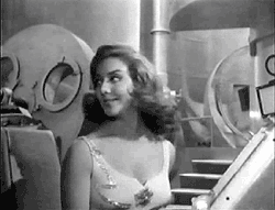 Lorena Velazquez as Beta. Apparently Venusian women are named in descending order of hotness.